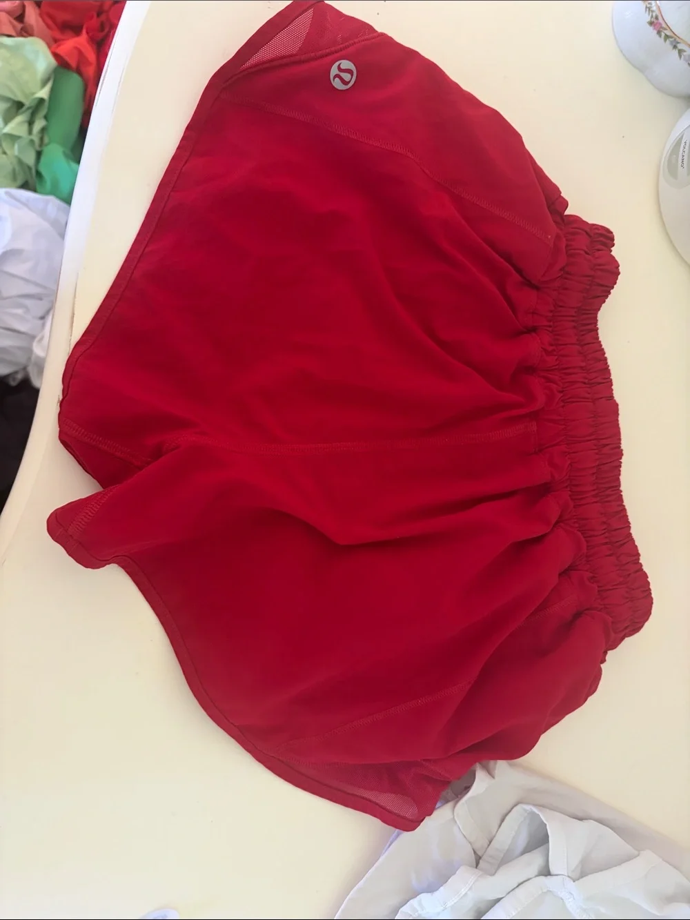 RED LULULEMON SHORTS: Size 2, 2.5 Inch